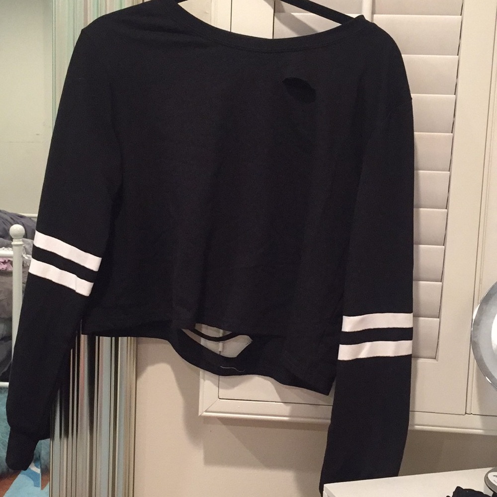 Black sweatshirt with a white stripe on the arms